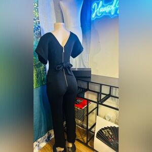 Closet Blk Short-Sleeve
Jumpsuit w Back Exposed Zip and Waist Tie/Front Pockets